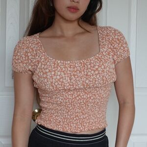 Muted orange floral top